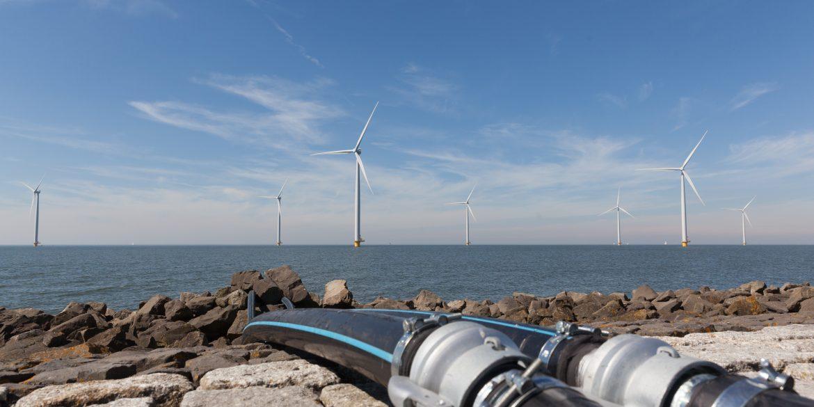 Submarine Power Cable Current Ratings (2025 update) Cables in front of a group of windmills for renewable electric energy production 1170x585 - Submarine Power Cable Current Ratings (2025 update)