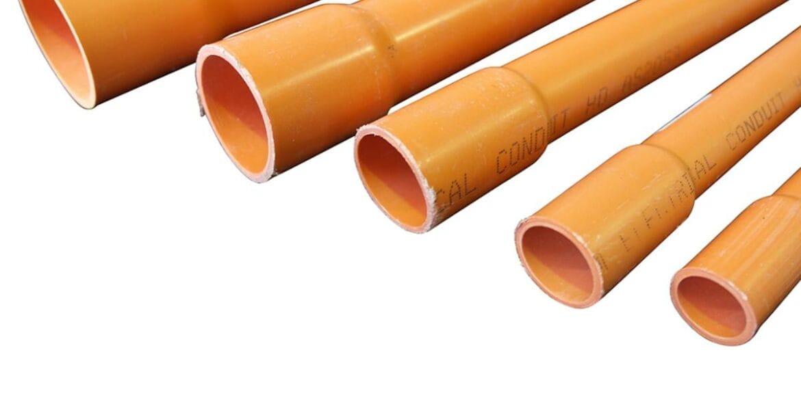 Orange PVC electrical conduit of different sizes