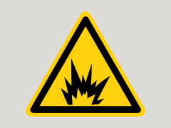 A yellow and black triangular warning sign featuring a lightning bolt and jagged lines, indicating an electrical hazard.